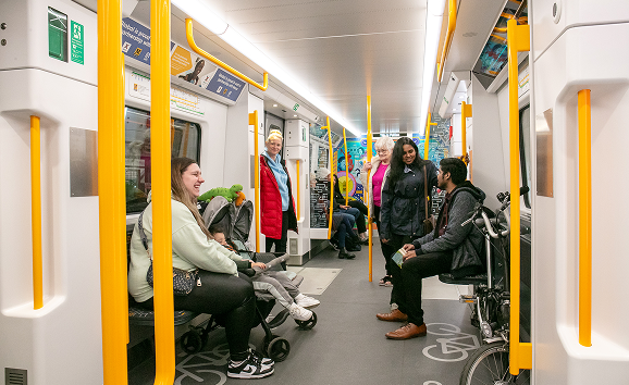 Customers on a new Metro