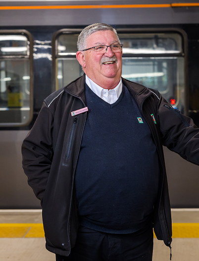 A nexus employee laughing